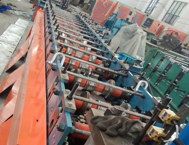 Product What is the proportion of material cost to total production cost for upright roll forming machine?-Dingbo Roll Forming Machine image