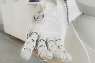 Photo of a Robot stretching its hand out