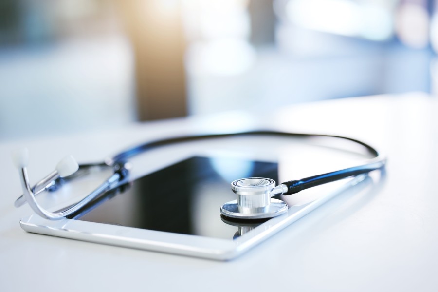 A tablet on which a stethoscope is placed