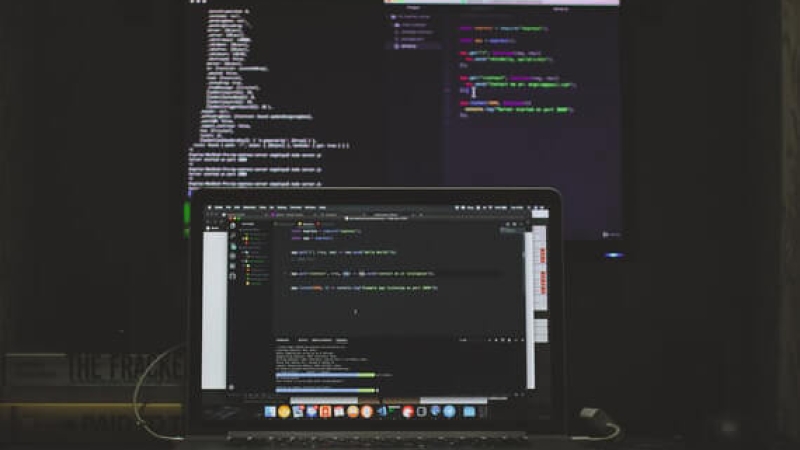 Code is presented on a laptop